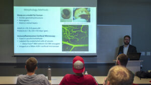 Matt Byrne presenting his research on the morphological properties of retinal vasculature at the University of Utah in Salt Lake City, UT on Monday, Aug. 20, 2018. (Photo by Kiffer Creveling)